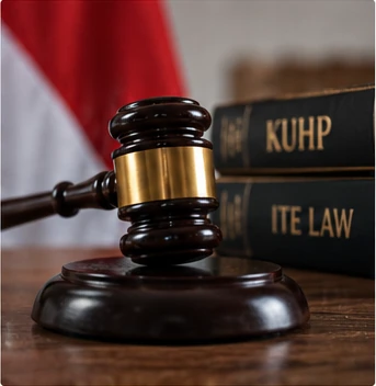 Gavel and Indonesian legal reference books